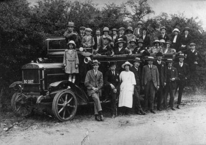 A charabanc with passengers